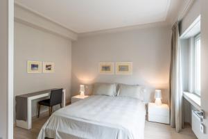 Postel nebo postele na pokoji v ubytování Four Stars Aparthotel