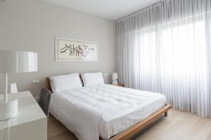Postel nebo postele na pokoji v ubytování Four Stars Aparthotel