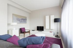 TV a/nebo společenská místnost v ubytování Four Stars Aparthotel
