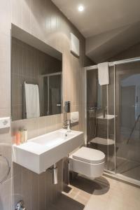 Koupelna v ubytování Four Stars Aparthotel