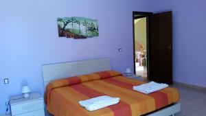 A bed or beds in a room at Villa Cristina