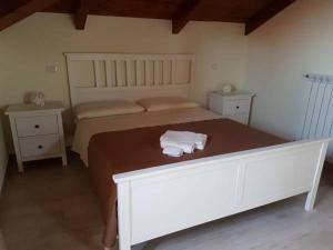 Postel nebo postele na pokoji v ubytování B&B da Mary