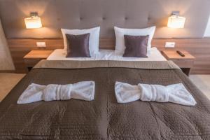 Postel nebo postele na pokoji v ubytování Hotel Thermalpark