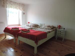 Postel nebo postele na pokoji v ubytování Pod Miotełką