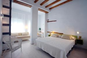 Postel nebo postele na pokoji v ubytování OttoH Charm Stay