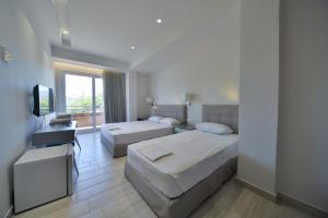 Fotografie z fotogalerie ubytování Hotel Kakanakos v destinaci Loutra Oraias Elenis + 34 fotografií