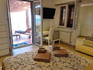 Posezení v ubytování Brezza Marina Guesthouse