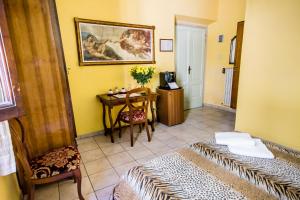 Postel nebo postele na pokoji v ubytování Hotel Il Bargellino