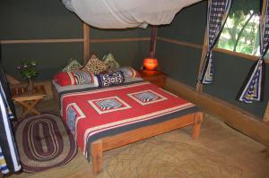 Tempat tidur dalam kamar di The Beach Crab Resort