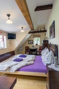 Postel nebo postele na pokoji v ubytování Penzion Nostalgie 1876