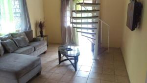 Predel za sedenje v nastanitvi Caribbean Dream Vacation Property CD1