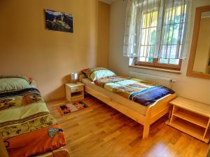 Кровать или кровати в номере Vila Veronika
