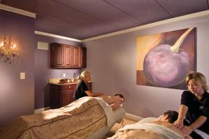 a group of people in a room with beds at John Carver Inn & Spa in Plymouth