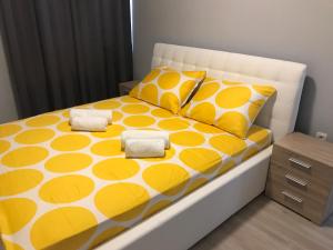 Ένα ή περισσότερα κρεβάτια σε δωμάτιο στο Apartmani Nina