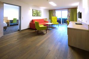 TV a/nebo společenská místnost v ubytování Hotel Achentalerhof