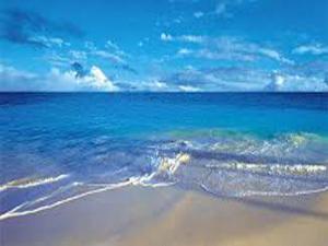 a view of a beach with the ocean and the sky at Villa Cemaste in Montpellier