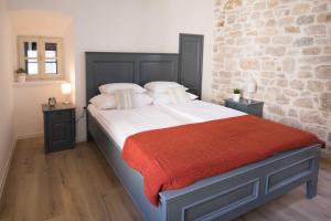 Postelja oz. postelje v sobi nastanitve Mediterraneo Luxury Rooms