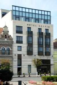 a building with a hotel sign on the front of it at Hotel Beyfin in Cluj-Napoca