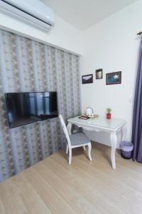 TV a/nebo společenská místnost v ubytování Jin Du Yi Yuan B & B