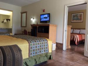Postel nebo postele na pokoji v ubytování Texas Inn - Welasco/Mercedes