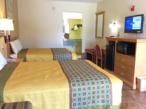 Postel nebo postele na pokoji v ubytování Texas Inn - Welasco/Mercedes