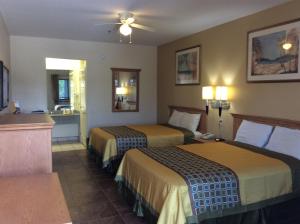 Postel nebo postele na pokoji v ubytování Texas Inn - Welasco/Mercedes + 28 fotografií
