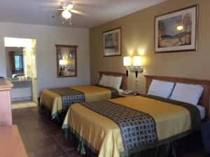 Postel nebo postele na pokoji v ubytování Texas Inn - Welasco/Mercedes