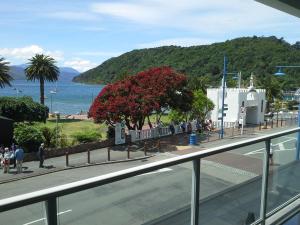 a view of the ocean from a balcony of a building at No 3 @ The Quay in Picton