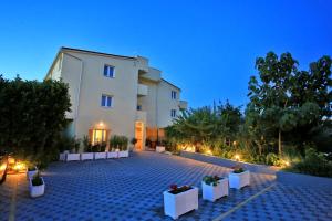 Vonkajšia záhrada v ubytovaní Apartments & rooms Stella Adriatica