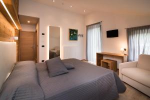 Postel nebo postele na pokoji v ubytování Hotel Ferrovia