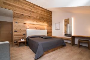 Postel nebo postele na pokoji v ubytování Hotel Ferrovia
