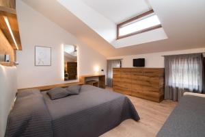 Postel nebo postele na pokoji v ubytování Hotel Ferrovia