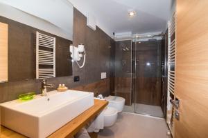Koupelna v ubytování Hotel Ferrovia
