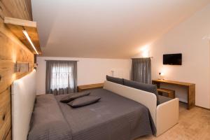 Postel nebo postele na pokoji v ubytování Hotel Ferrovia
