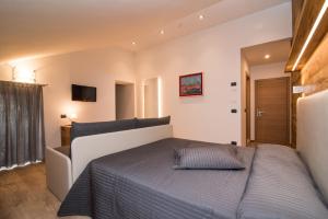 Postel nebo postele na pokoji v ubytování Hotel Ferrovia