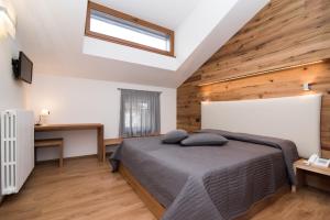 Postel nebo postele na pokoji v ubytování Hotel Ferrovia
