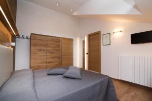 Postel nebo postele na pokoji v ubytování Hotel Ferrovia