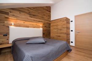 Postel nebo postele na pokoji v ubytování Hotel Ferrovia