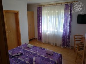 Posteľ alebo postele v izbe v ubytovaní Stari mlin