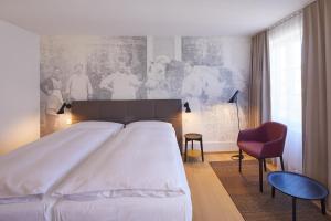 Ein Bett oder Betten in einem Zimmer der Unterkunft Hotel Gasthof zum Ochsen