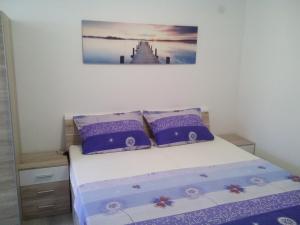 Posteľ alebo postele v izbe v ubytovaní Holiday Home Babič