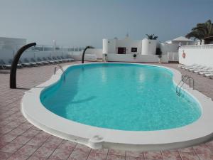 Der Swimmingpool an oder in der Nähe von Bungalow Mariano 140