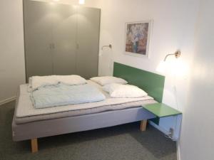 Postel nebo postele na pokoji v ubytování Strandlejlighed 101 - Fanø Bad