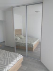 Postel nebo postele na pokoji v ubytování Apartment Belas