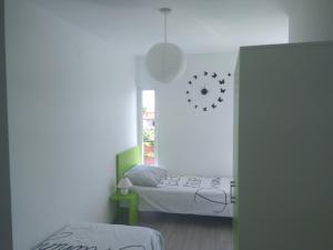 Postel nebo postele na pokoji v ubytování Apartment Belas
