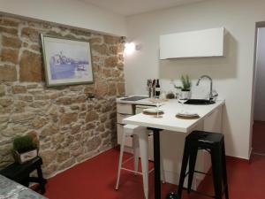 Kuchyň nebo kuchyňský kout v ubytování Littel studio Franceska