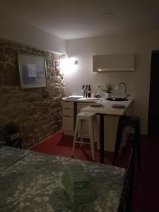 Kuchyň nebo kuchyňský kout v ubytování Littel studio Franceska