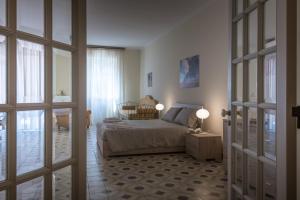 Postel nebo postele na pokoji v ubytování Suite della villa