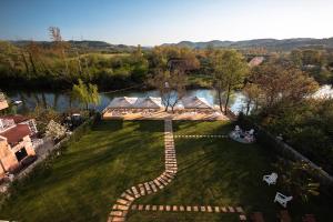 an aerial view of a garden with a walkway at The Escape Hotel in Agva