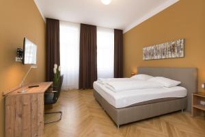 Łóżko lub łóżka w pokoju w obiekcie Vienna Stay Apartments Pezzl 1170
